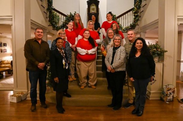 First Lady Trudi Inslee and Secretary Strange take a photo with the women from WCCW and MCCCW who decorated the Governor’s Mansion.