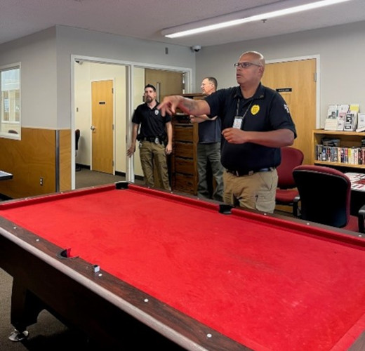 Staff and Residents participating in a dart tournament