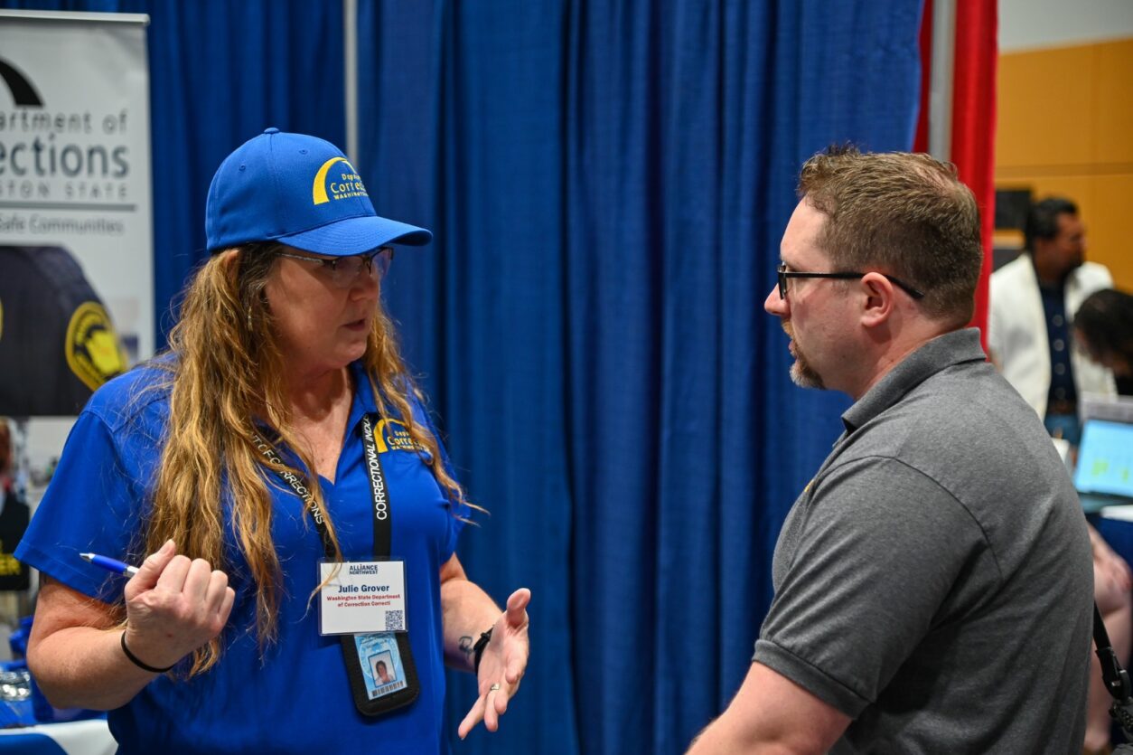 business diversity doc team member speaking with individual