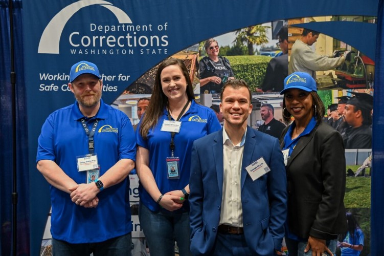 business diversity doc team members standing side by side with a vendor
