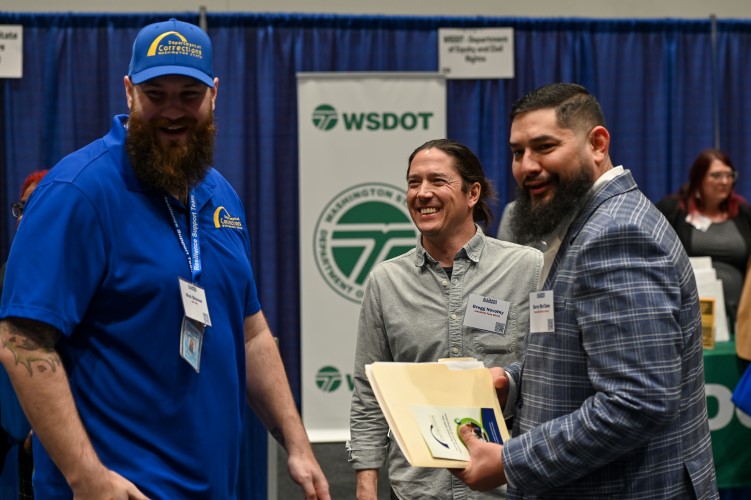 group of people talking at vendor event