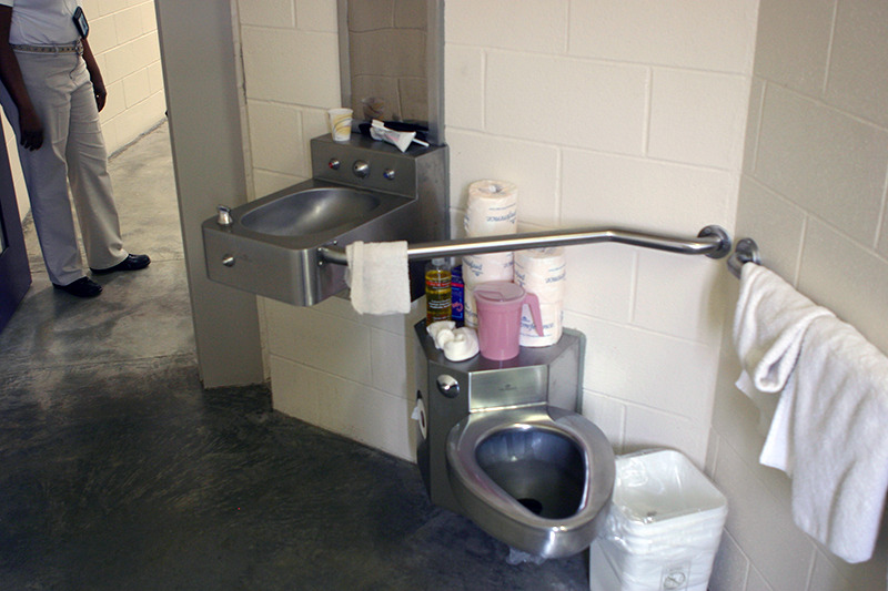 stainless steel toilet, sink and accessibility grab bar