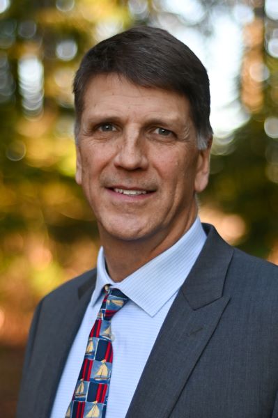 professional portrait of secretary tim lang